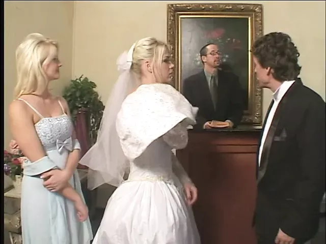 Blonde Bride fucks two hard cocks in bed