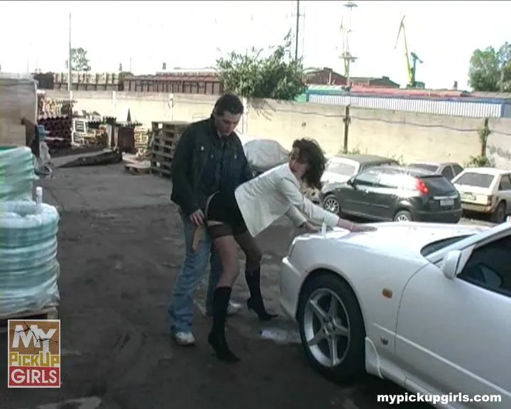 Clothed girl gets fucked on a car hood