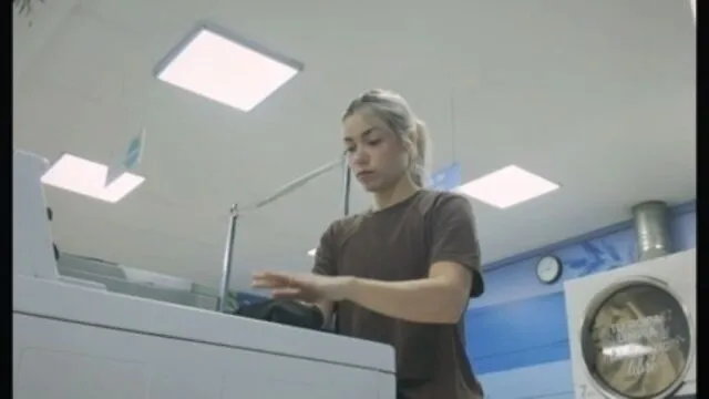 A Lonely Girl Receives Help from a Stranger at the Laundromat